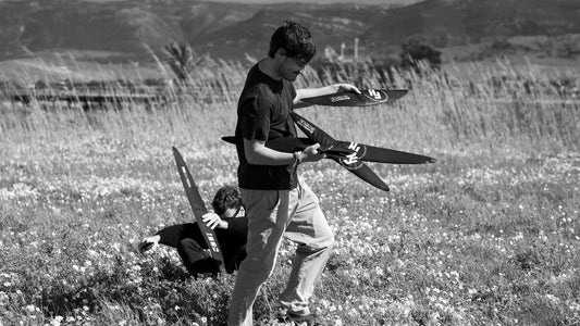 Rider in motion through wildflowers with a foil under arm
