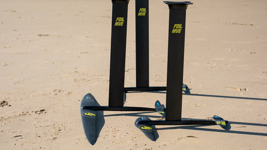 Multiple foil setups fanned out on Tarifa beach