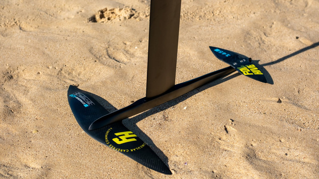 FoilHive setup on Tarifa beach sand with the Atlantic horizon